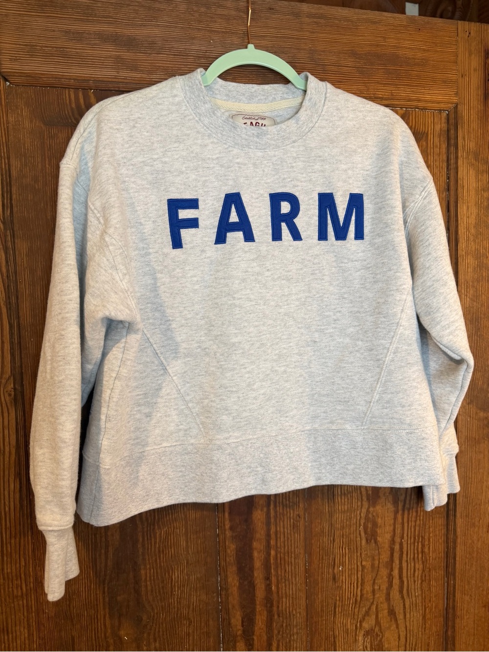 League Gray Sweatshirt with Blue Lettering